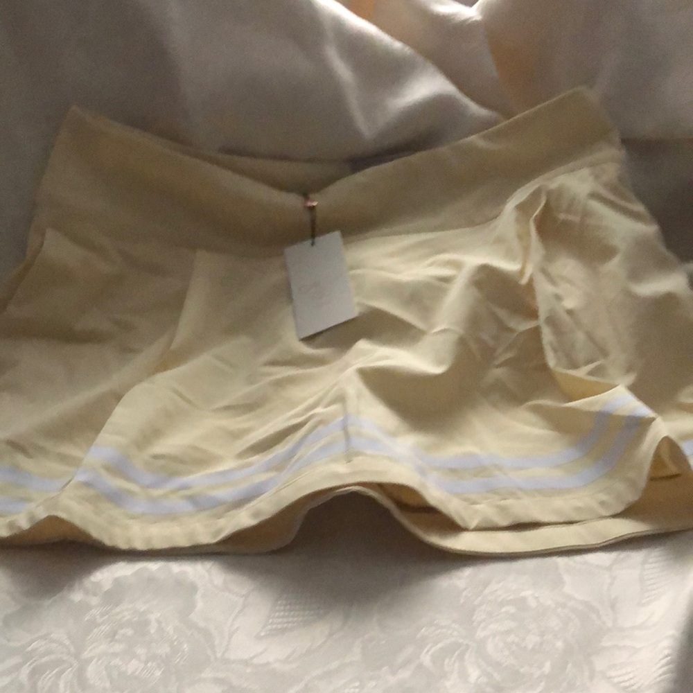 Calia Women's light yellow golf Skorts